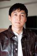  傳